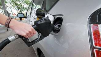 Hybrid Car At The Pump