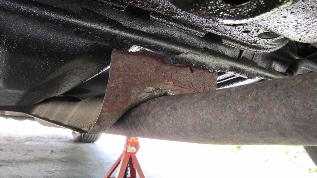 Heat shield rattle when accelerating