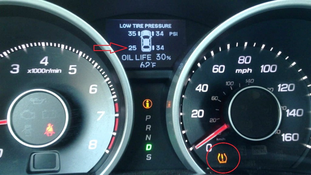 This Acura dash has the TPMS warning lit, and shows the left rear tire at just 25 psi