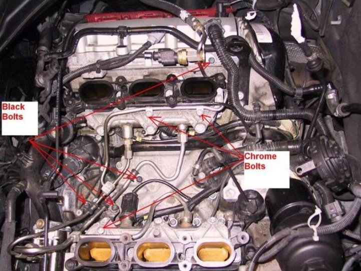 remove mounting bolts and pressurize lines to the lower intake