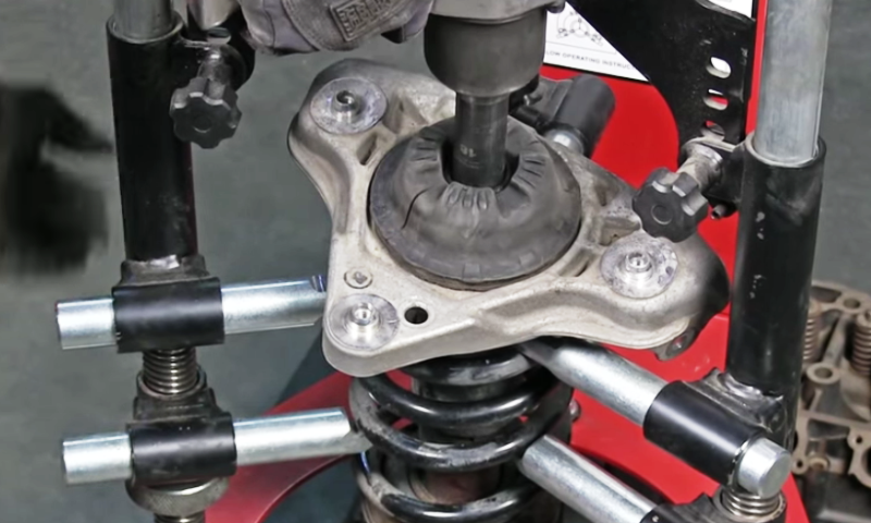 Use cation whenever using a spring compressor to remove coil over springs.