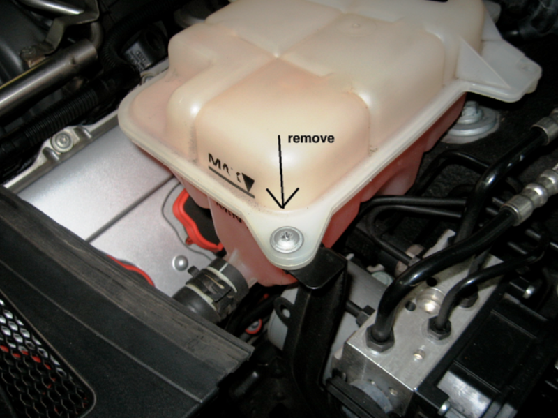 Place the coolant reservoir aside