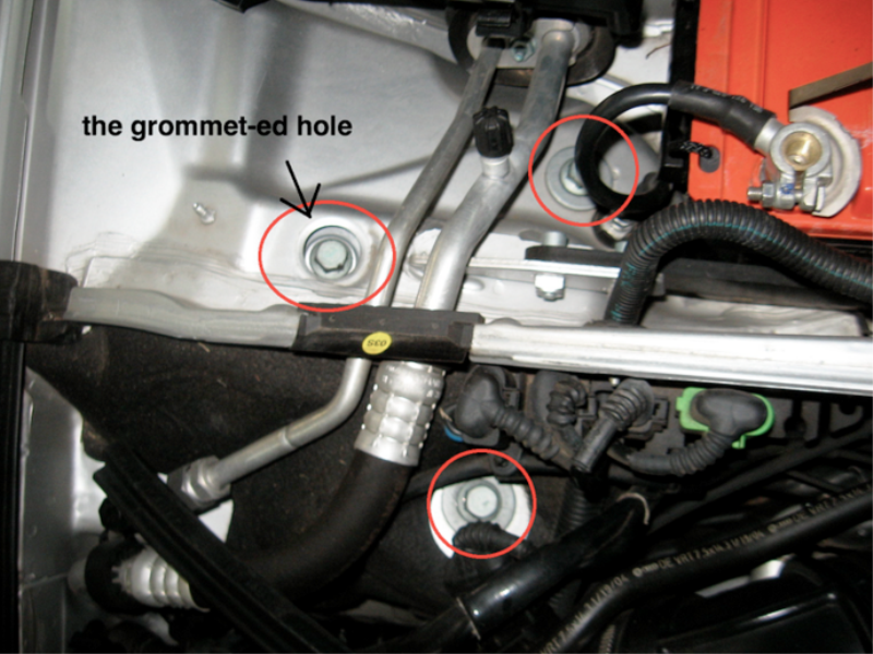 Remove the top mounting bolts
