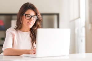 woman doing research on computer