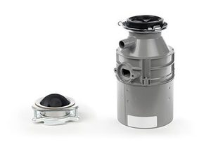 Two components to a garbage disposal sit against a white background.