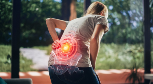 Woman has lower back pain.