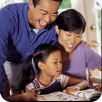 image of parents sitting down with young girl reading