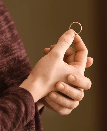 wedding ring held in hand representing marriage annulment