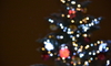 A lighted Christmas tree. 