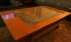 A rolling coffee table built from scrap and an ornamental carpet.