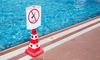 a red cone with a "do not dive" sign on it