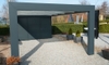 Carport with gravel parking space