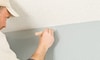 cutting in wall paint along the ceiling