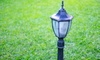 Lamp post with grass in the background