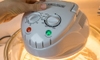 hand using halogen oven cooking device