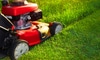 A lawn mower cuts grass.