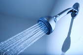 A shower head spraying water