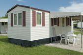 a mobile home with awning