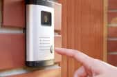 pushing a button on a door entry system