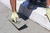 leveling concrete with a tool