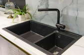 black two-sided kitchen sink