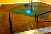A highly reflective, polished concrete floor.