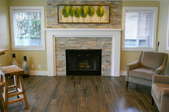 A living room with wood grain tile.