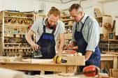 men in workshop making woodworking projects