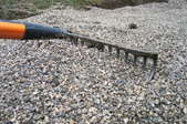rake moving loose gravel