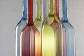 Several colored glass bottles