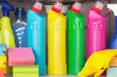 colorful cleaning products under a kitchen sink