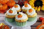 A cupcake stand with Thanksgiving cupcakes. 