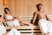 People relaxing in a sauna