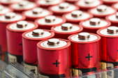 A bunch of red batteries.