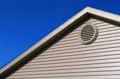 An exterior view of an attic vent.