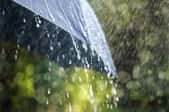 Rainwater running off an umbrella