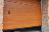 wood-look garage door partially opened