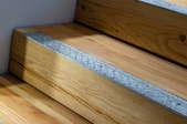 Wooden stairs with slip prevention strip