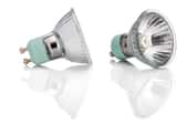 A pair of halogen light bulbs on a white, reflective surface.
