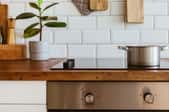 induction stove in clean, modern kitchen