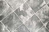 grey and white tile-look vinyl flooring
