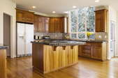 kitchen with wood cabinets and flooring