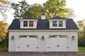 Double car garage with carriage doors
