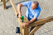 Man building a pergola