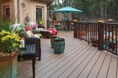 deck with railing and furniture