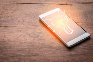 A smart phone with a light bulb illustration