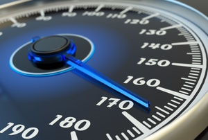 a speedometer with blue arrow