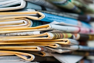 A stack of newspapers.