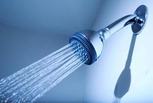 A shower head spraying water