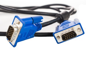 A VGA monitor cable on a white background.